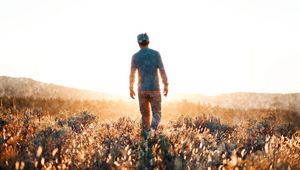 Preview wallpaper man, field, sunlight, light, bright