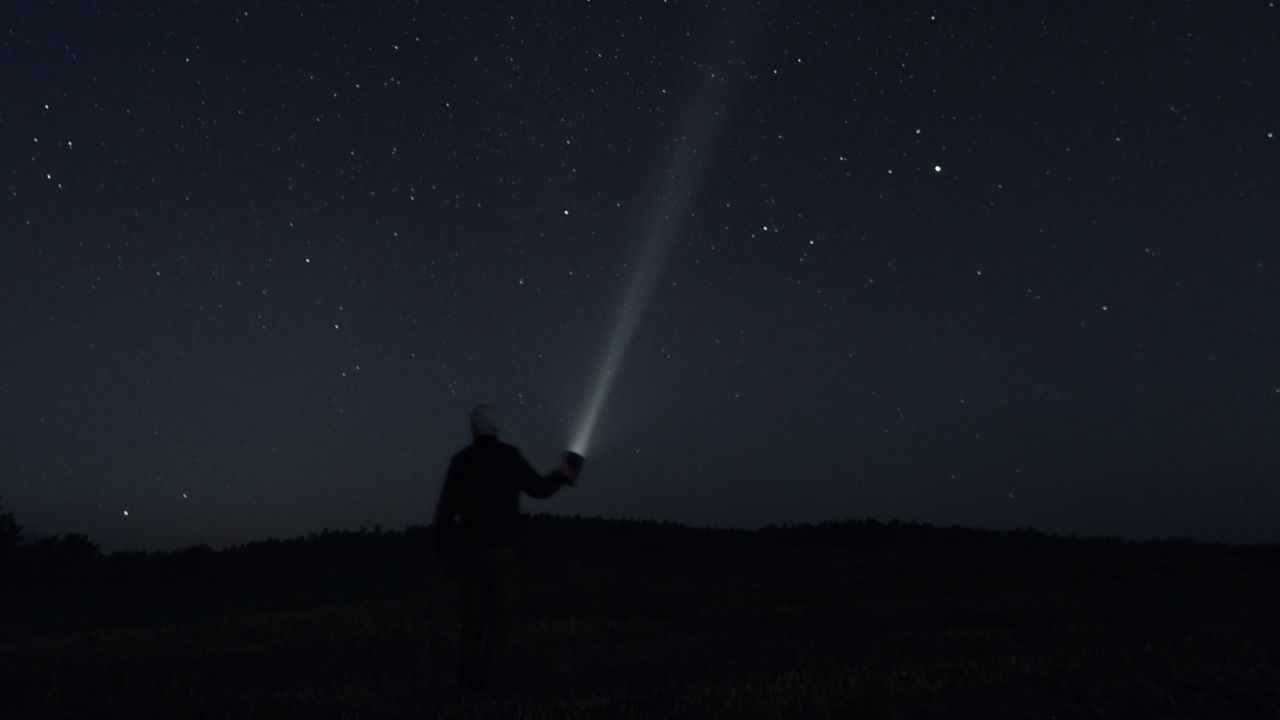 Wallpaper man, flashlight, starry sky, night, darkness