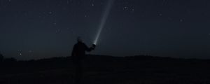 Preview wallpaper man, flashlight, starry sky, night, darkness