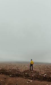 Preview wallpaper man, fog, landscape, deserted
