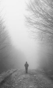 Preview wallpaper man, fog, loneliness, mist, bw