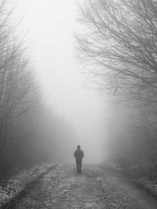 Preview wallpaper man, fog, loneliness, mist, bw