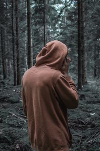 Preview wallpaper man, forest, hoodie, walk