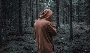 Preview wallpaper man, forest, hoodie, walk