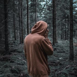 Preview wallpaper man, forest, hoodie, walk