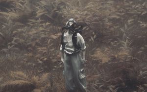 Preview wallpaper man, gas mask, branches, grass, art