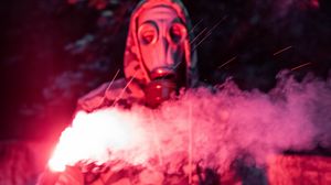 Preview wallpaper man, gas mask, fire, smoke, sparks