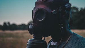 Preview wallpaper man, gas mask, mask, dark