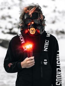 Preview wallpaper man, gas mask, mask, glance, pyrotechnics, fire