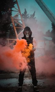 Preview wallpaper man, gas mask, mask, smoke, orange