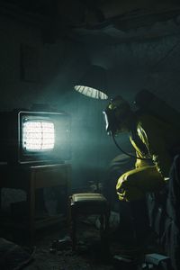 Preview wallpaper man, gas mask, mask, tv, dark