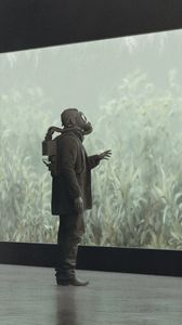 Preview wallpaper man, gas mask, screen, plants, dark