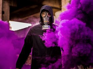 Preview wallpaper man, gas mask, smoke, purple