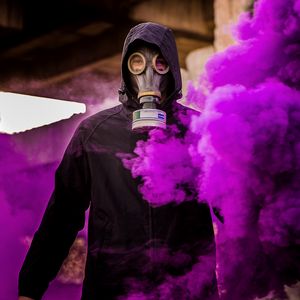 Preview wallpaper man, gas mask, smoke, purple