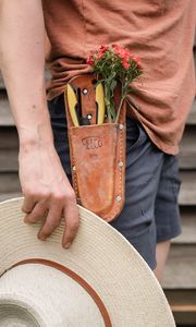 Preview wallpaper man, hand, flowers, hat