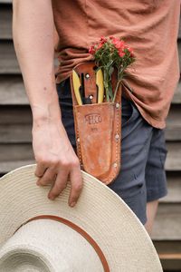 Preview wallpaper man, hand, flowers, hat