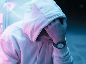 Preview wallpaper man, hand, hood, sad