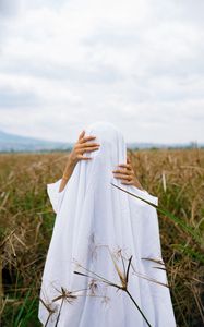 Preview wallpaper man, hands, cloth, field, anonymous