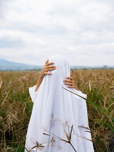 Preview wallpaper man, hands, cloth, field, anonymous