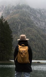 Preview wallpaper man, hat, river, trees, mountain, travels