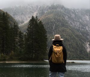 Preview wallpaper man, hat, river, trees, mountain, travels