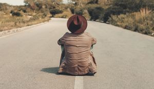 Preview wallpaper man, hat, road, asphalt, loneliness