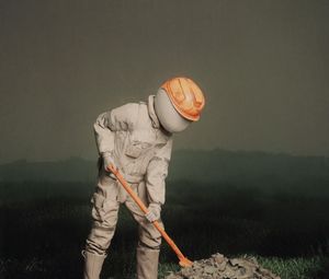 Preview wallpaper man, helmet, shovel, stones, art