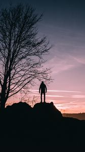 Preview wallpaper man, hill, trees, evening