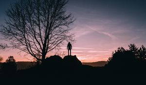 Preview wallpaper man, hill, trees, evening