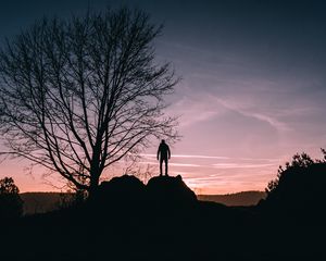 Preview wallpaper man, hill, trees, evening