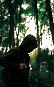 Preview wallpaper man, hood, anonymous, forest