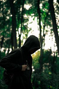 Preview wallpaper man, hood, anonymous, forest