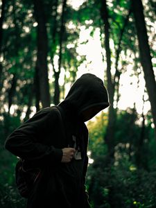 Preview wallpaper man, hood, anonymous, forest