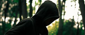 Preview wallpaper man, hood, anonymous, forest