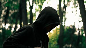 Preview wallpaper man, hood, anonymous, forest