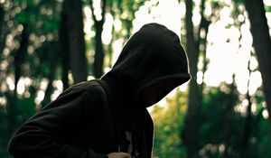 Preview wallpaper man, hood, anonymous, forest