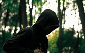 Preview wallpaper man, hood, anonymous, forest