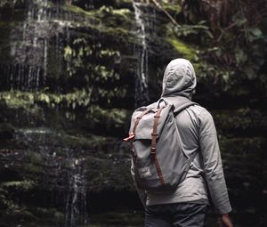 Preview wallpaper man, hood, backpack, waterfall