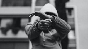 Preview wallpaper man, hood, gesture, black and white, bw