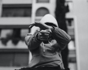 Preview wallpaper man, hood, gesture, black and white, bw