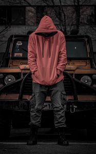 Preview wallpaper man, hood, hoodie, car, jeep