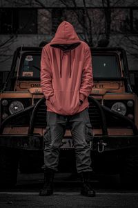 Preview wallpaper man, hood, hoodie, car, jeep