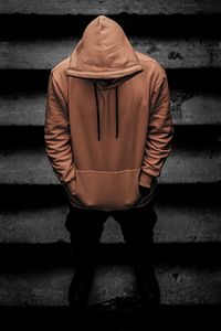 Preview wallpaper man, hood, hoodie, stairs