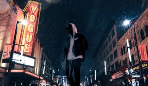 Preview wallpaper man, hood, night city, snowfall, street