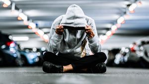 Preview wallpaper man, hood, reflection, loneliness