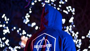 Preview wallpaper man, hoodie, print, symbol