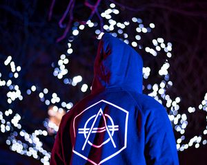 Preview wallpaper man, hoodie, print, symbol