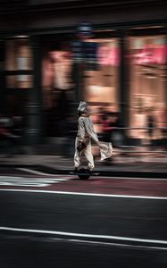 Preview wallpaper man, hoverboard, street, city, road