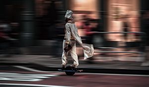 Preview wallpaper man, hoverboard, street, city, road