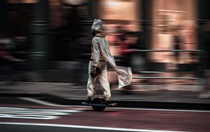 Preview wallpaper man, hoverboard, street, city, road